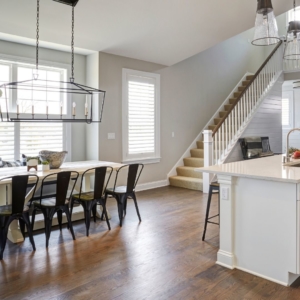 a dining room with stairway in a hinsdale home